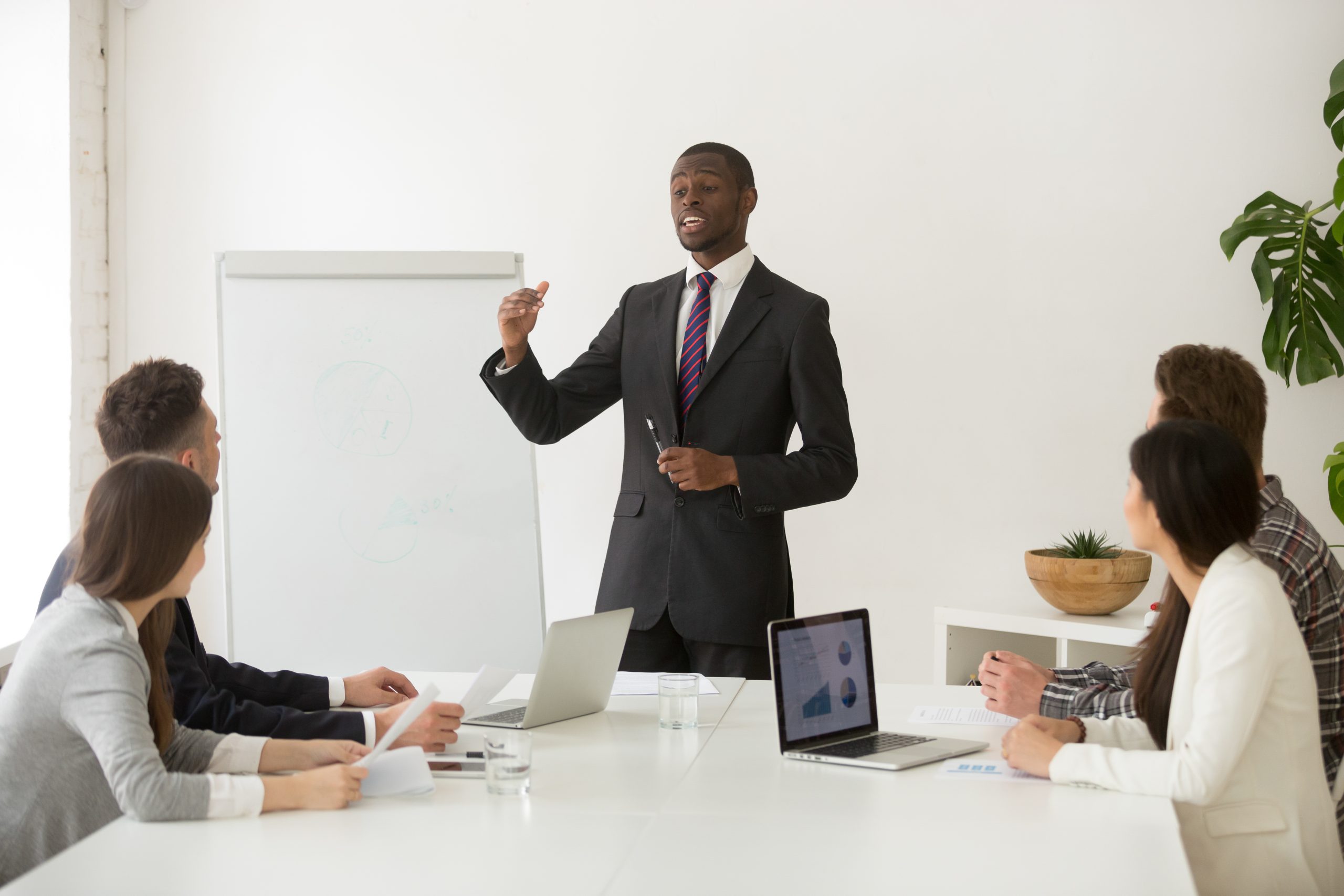 Business coach giving presentation